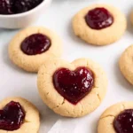 Easy-Jam-Thumbprint-Cookies-with-a-Heart-Shaped-Twist-Recipe